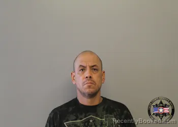 Mugshot of FRANK WILLIAM OLVERA booked in Tulsa County, Oklahoma on May 8, 2026