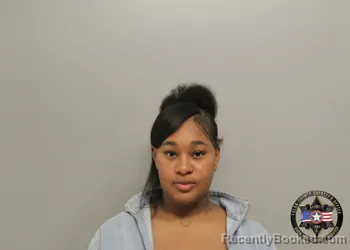 Mugshot of NXACIA AMERSIE COOPER booked in Tulsa County, Oklahoma on May 9, 2026