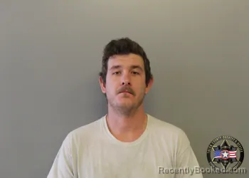 Mugshot of JOSHUA DANIEL TAYLOR booked in Tulsa County, Oklahoma on May 12, 2026