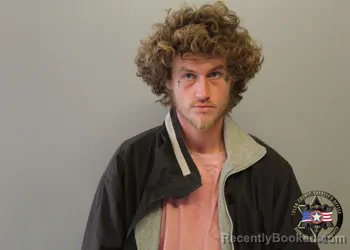 Mugshot of DEVIN EUGENE TODD booked in Tulsa County, Oklahoma on June 30, 2026