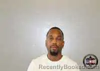 Mugshot of Dominique Andre Rowens booked in Tulsa County, Oklahoma on August 13, 2026