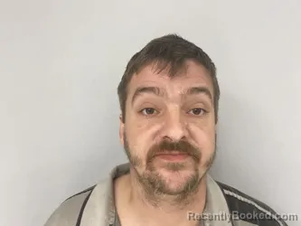 Mugshot of SCOTT SIMPSON