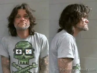 Mugshot of JASON LENN DUFOE