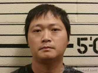 Mugshot of KEJUN TANG booked in Washita County, Oklahoma on July 18, 2026