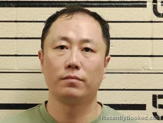 Mugshot of Zhe Zhang booked in Washita County, Oklahoma on August 28, 2026