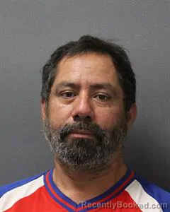 Mugshot of ALBERT FLORES booked in Cooke County, Texas on June 25, 2026