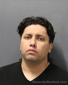 Mugshot of Emmanuel Isaac Tonche-Enriquez booked in Cooke County, Texas on August 14, 2026