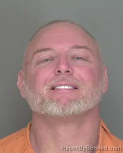 Mugshot of CHRISTOPHER MICHAEL LEIGH