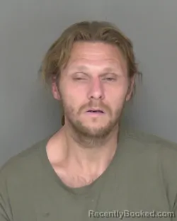 Mugshot of MICKEAL WAYNE FLORES