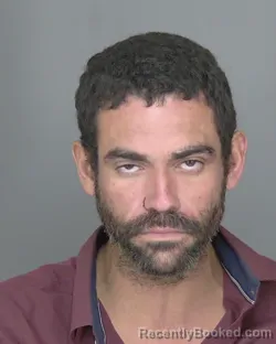 Mugshot of Joseph Joel Ortiz-Camacho booked in Highlands County, Florida on August 21, 2026