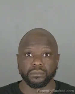 Mugshot of Carl Roodny Belony