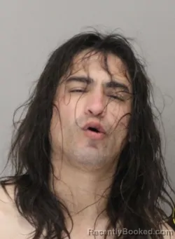 Mugshot of JULIOS CASTRO