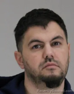 Mugshot of CLINTON GOMEZ