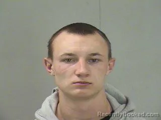 Mugshot of CODY HUGHES