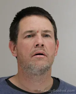 Mugshot of JUSTIN HERT