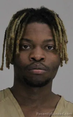 Mugshot of JEAN KAMANDA