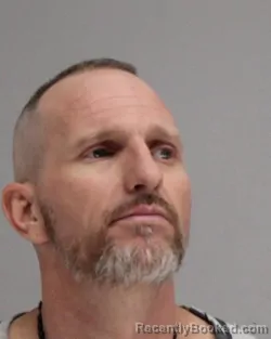 Mugshot of Charles Gibsonredding