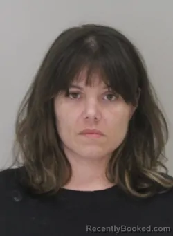 Mugshot of MEGAN FARHAT booked in Dallas County, Texas on March 18, 2026