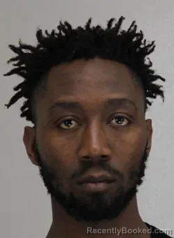 Mugshot of FELIX NYACHWAYA booked in Dallas County, Texas on March 22, 2026