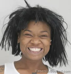 Mugshot of DELAVENCIA LEE