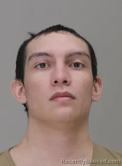 Mugshot of JUSTIN CARO