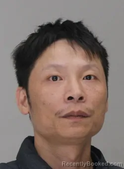 Mugshot of JIAN LI booked in Dallas County, Texas on March 28, 2026