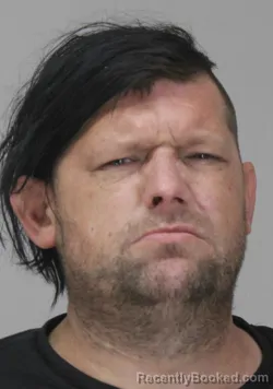 Mugshot of JONATHAN FITZSIMMONS booked in Dallas County, Texas on March 30, 2026