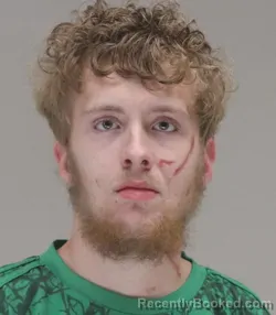 Mugshot of AARON TUTT booked in Dallas County, Texas on March 31, 2026