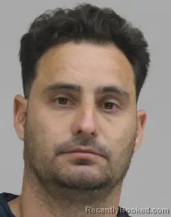 Mugshot of REINIER ISIDRONINVERNON booked in Dallas County, Texas on April 1, 2026