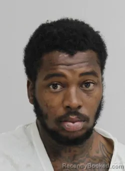 Mugshot of GEORGE HOLMES booked in Dallas County, Texas on April 1, 2026