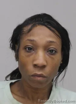 Mugshot of DOMINIQUE BELL booked in Dallas County, Texas on April 2, 2026