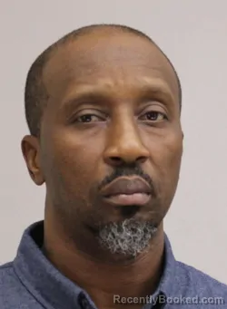 Mugshot of ALEX SIMMONS booked in Dallas County, Texas on April 2, 2026