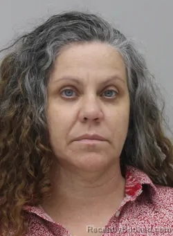 Mugshot of JENNIFER CURTISS booked in Dallas County, Texas on April 2, 2026