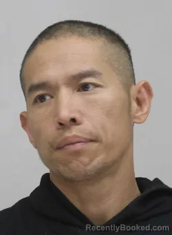 Mugshot of JONATHAN TRINH booked in Dallas County, Texas on April 5, 2026