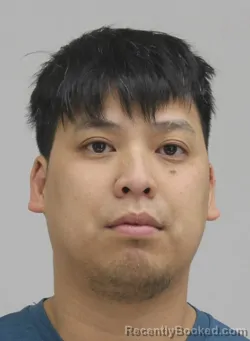 Mugshot of DUNG LE booked in Dallas County, Texas on April 7, 2026