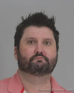 Mugshot of JOHN DAVIS booked in Dallas County, Texas on April 7, 2026