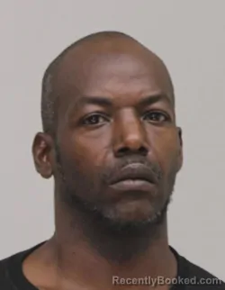 Mugshot of DONALD WOOLFOLK booked in Dallas County, Texas on April 8, 2026