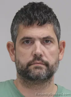 Mugshot of NATHANIEL DELP booked in Dallas County, Texas on April 8, 2026