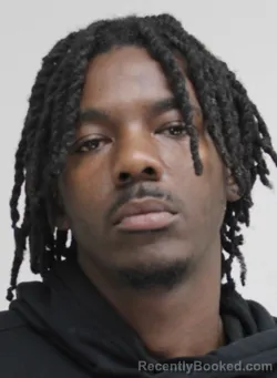 Mugshot of MALIK DAVIS booked in Dallas County, Texas on April 8, 2026