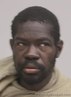 Mugshot of MUSTAFA MUHAMMAD booked in Dallas County, Texas on April 9, 2026