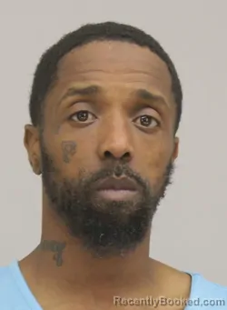 Mugshot of JUSTIN EVANS booked in Dallas County, Texas on April 9, 2026