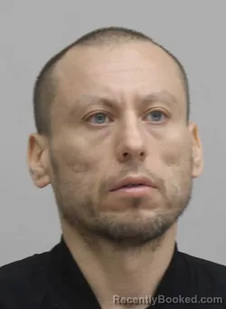 Mugshot of GUSTAVO KARNS booked in Dallas County, Texas on April 10, 2026