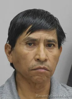 Mugshot of SANTOS MUNDOFLORES booked in Dallas County, Texas on April 10, 2026