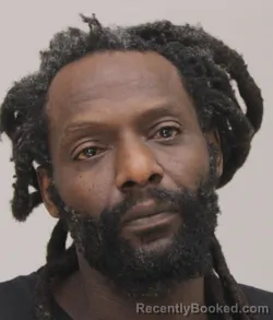 Mugshot of CLAUDE NORALIS booked in Dallas County, Texas on April 10, 2026