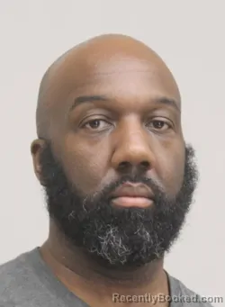 Mugshot of CHRISTOPHER BROWN booked in Dallas County, Texas on April 10, 2026