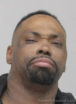 Mugshot of TARVIS RAYFORD booked in Dallas County, Texas on April 11, 2026