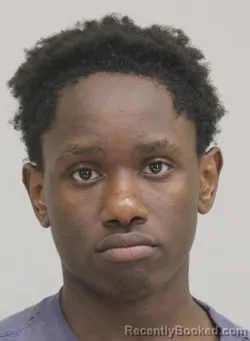 Mugshot of JOB NYAMEKENDO booked in Dallas County, Texas on April 11, 2026