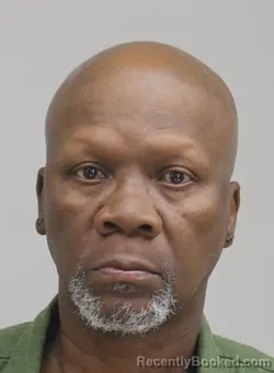 Mugshot of MICHAEL HOLLAND booked in Dallas County, Texas on April 12, 2026