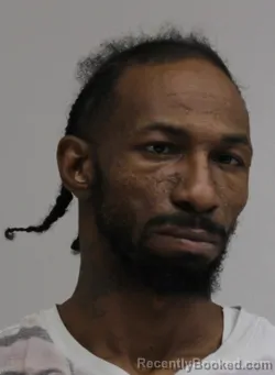 Mugshot of QUINTAVIS OWENS booked in Dallas County, Texas on April 12, 2026