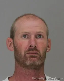 Mugshot of CHRISTOPHER BLACKBURN booked in Dallas County, Texas on April 12, 2026